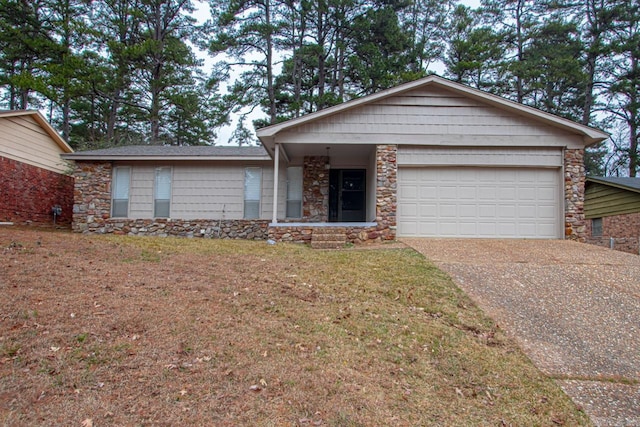 single story home with a front yard and a garage