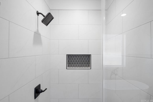 room details with a tile shower