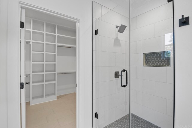 bathroom with an enclosed shower