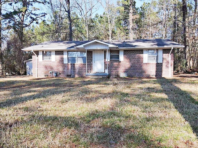 ranch-style house with a front lawn