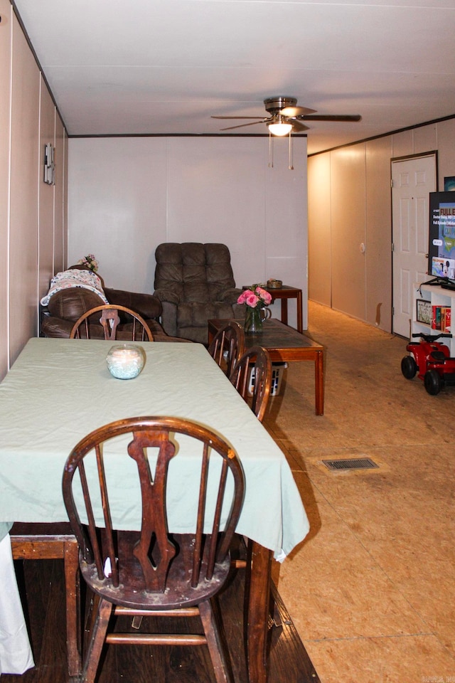 dining room featuring ceiling fan