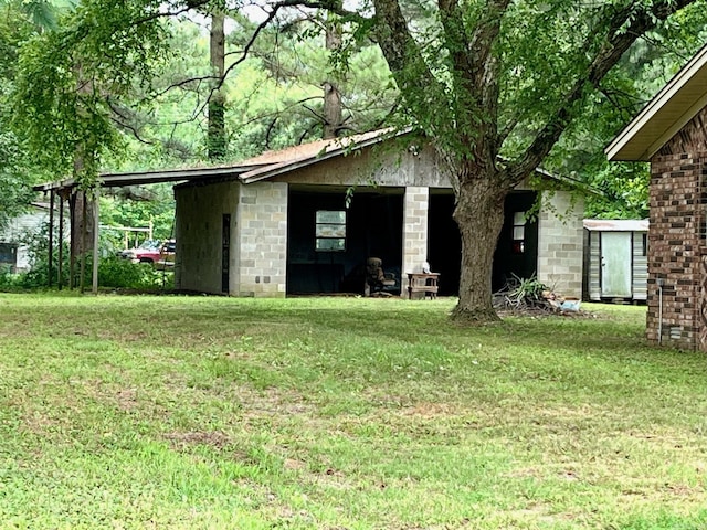 exterior space with a lawn