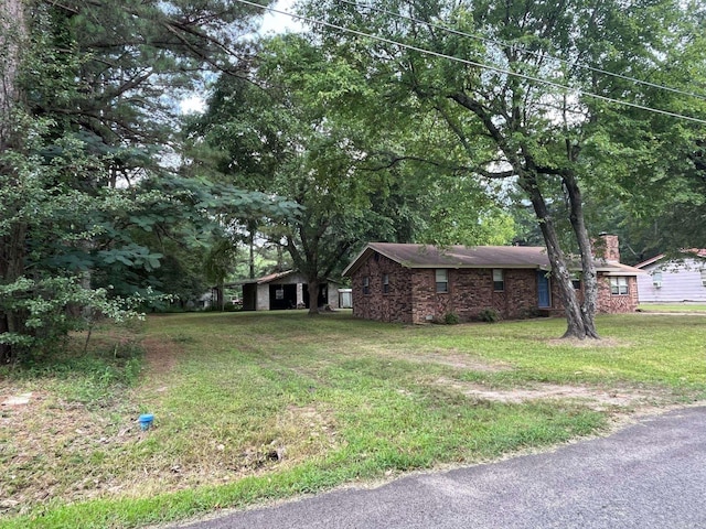 view of front of home with a front lawn