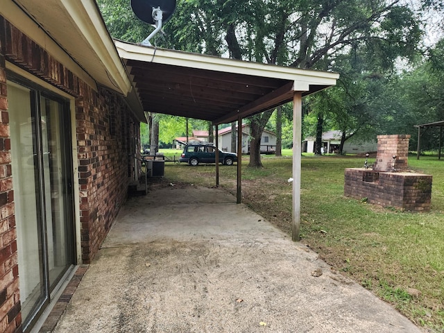 view of patio featuring a carport