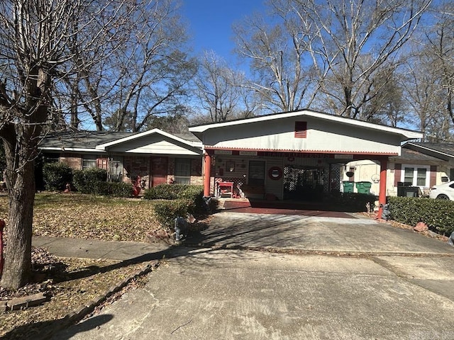 view of front of house with a carport