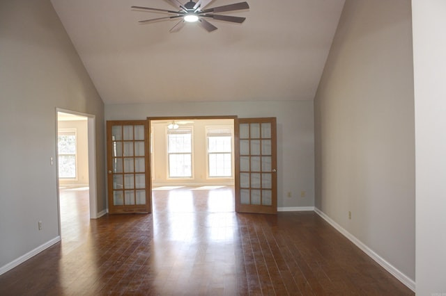 empty room featuring ceiling fan, french doors, and dark hardwood / wood-style flooring