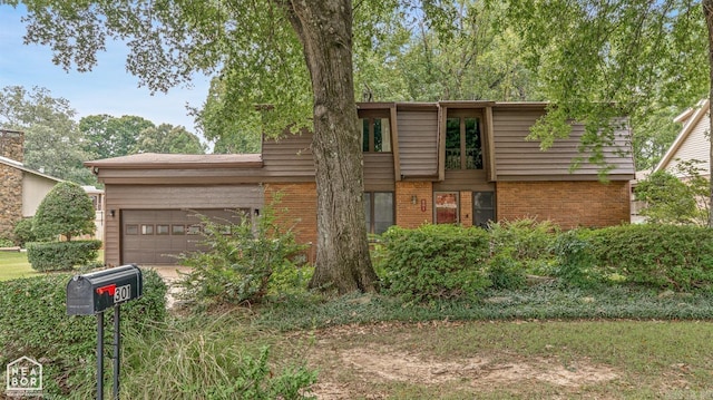 view of front property with a garage