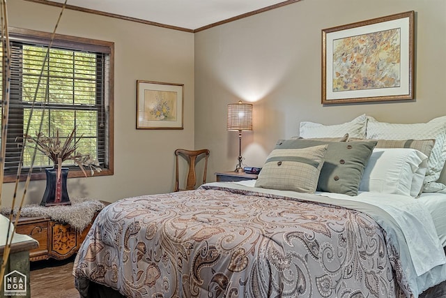 bedroom with crown molding