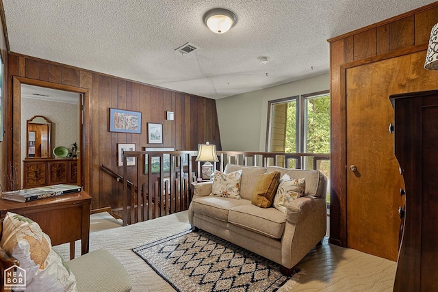 living room featuring wooden walls