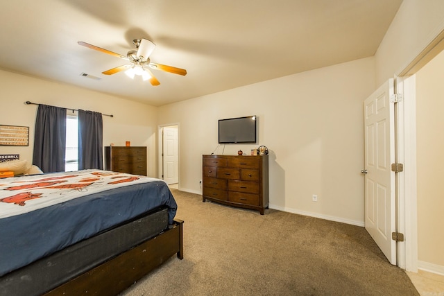 bedroom with light carpet and ceiling fan