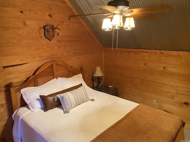 bedroom with wooden walls