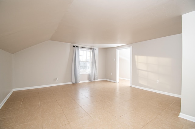 bonus room with vaulted ceiling