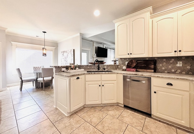 kitchen with light stone counters, kitchen peninsula, dishwasher, backsplash, and sink