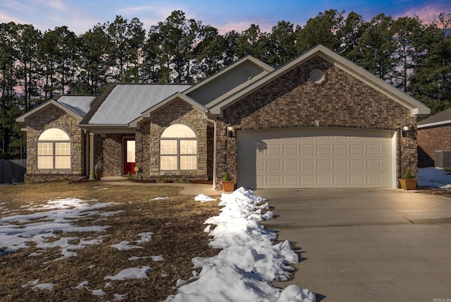 view of front of property with a garage