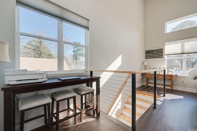 stairway featuring hardwood / wood-style flooring