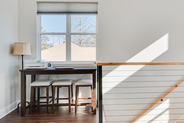 stairs with a healthy amount of sunlight and wood-type flooring