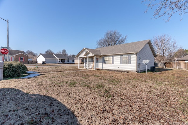 ranch-style house featuring a front yard