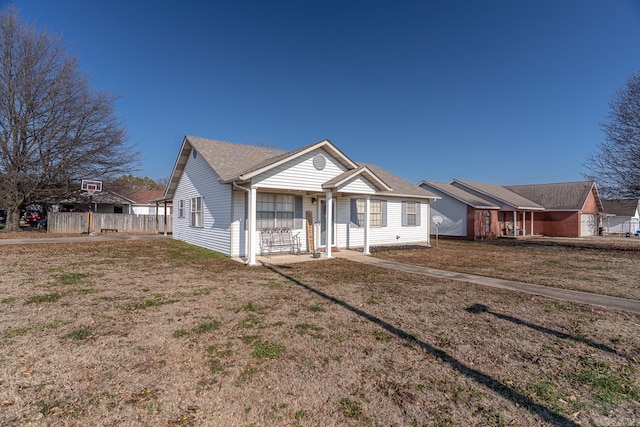 ranch-style house with a front lawn