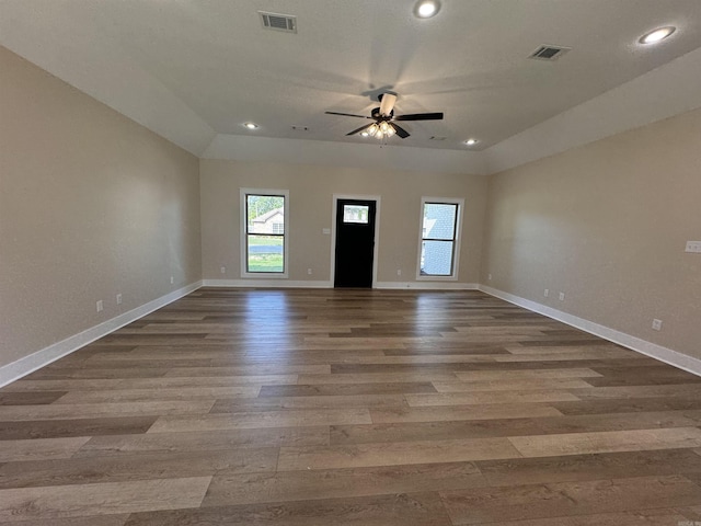 unfurnished room featuring ceiling fan and wood-type flooring