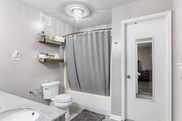 full bathroom featuring toilet, vanity, and shower / tub combo with curtain