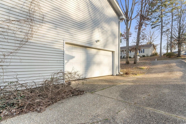 view of property exterior featuring a garage