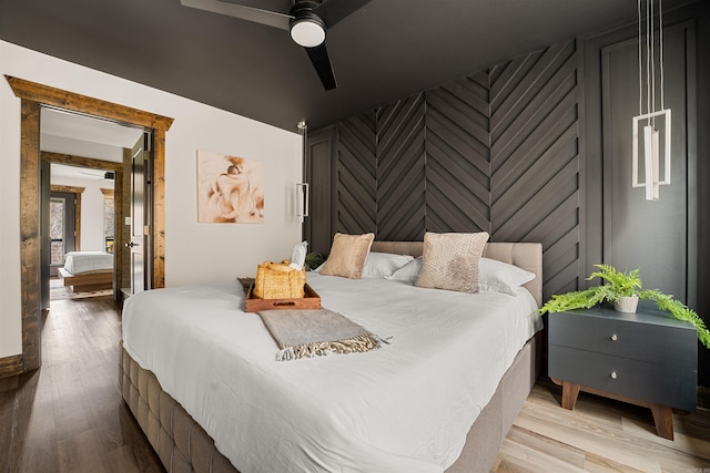 bedroom featuring ceiling fan and light wood-type flooring