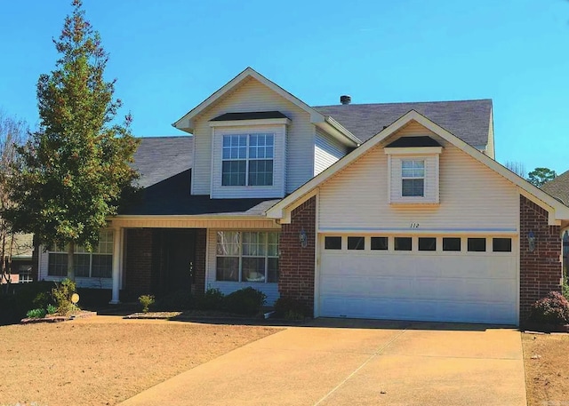 view of front of home with a garage