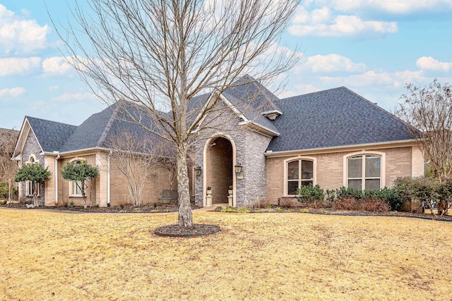 view of front of home with a front lawn