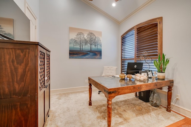 home office with ornamental molding and lofted ceiling