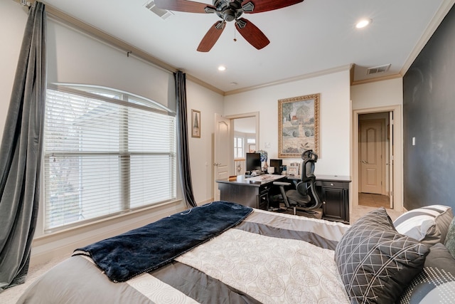 bedroom featuring ceiling fan, crown molding, and multiple windows