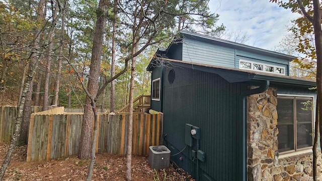 view of home's exterior featuring central air condition unit