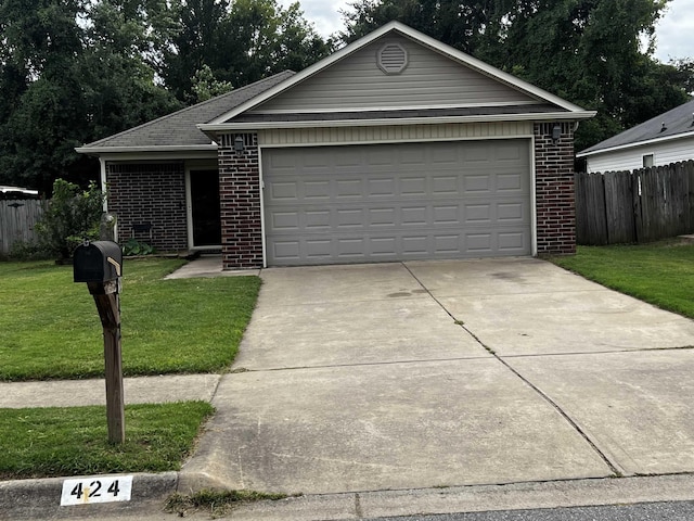 single story home featuring a garage and a front yard