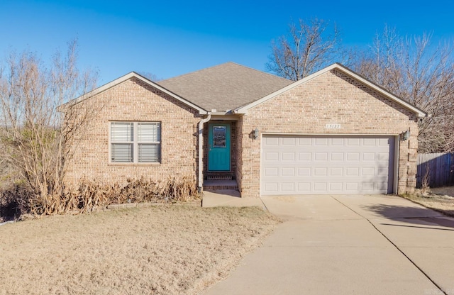 single story home featuring a garage