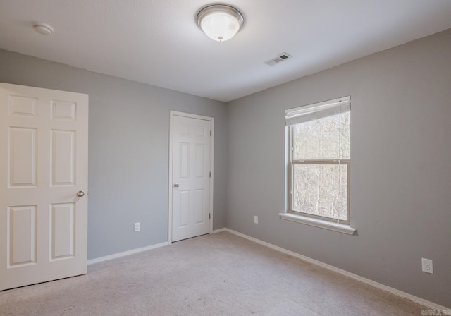 15137 Peak Loop, Alexander, AR 72002 - unfurnished bedroom with light carpet and baseboards