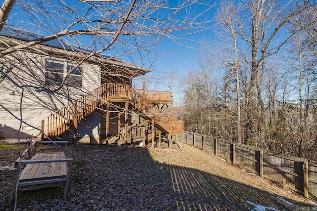 view of yard with a wooden deck