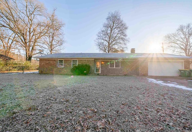 single story home featuring a garage