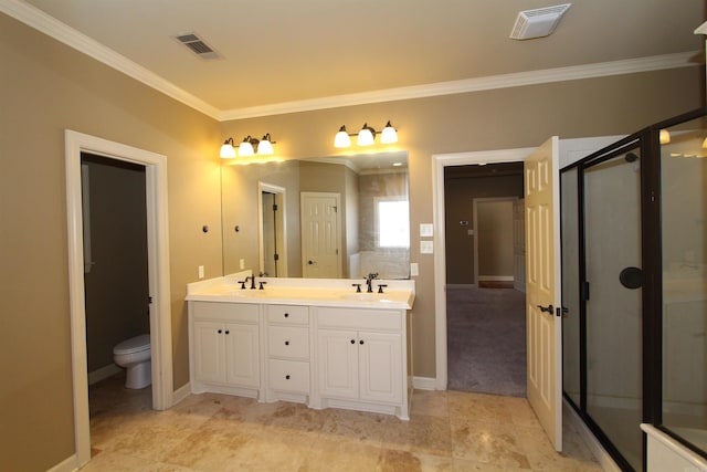 bathroom featuring toilet, a shower with door, ornamental molding, and vanity