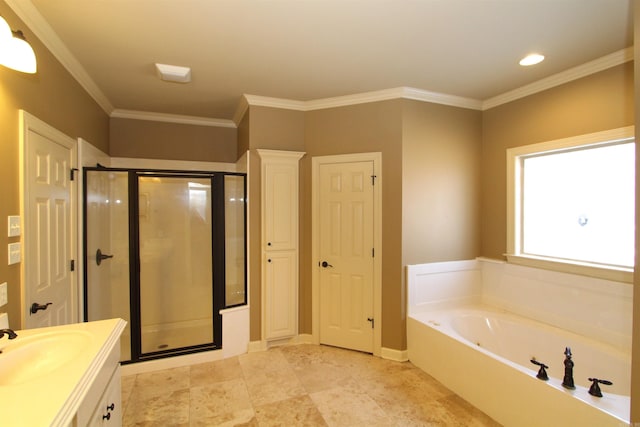 bathroom with plus walk in shower, ornamental molding, and vanity