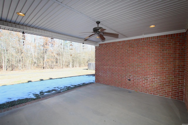 view of patio featuring ceiling fan