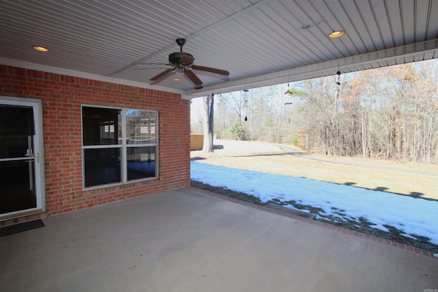 view of patio featuring ceiling fan