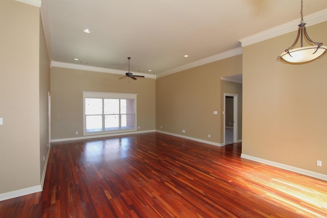 unfurnished room featuring ceiling fan, ornamental molding, and dark hardwood / wood-style floors