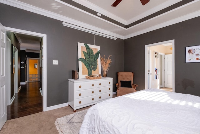 bedroom with ceiling fan, ornamental molding, and carpet flooring