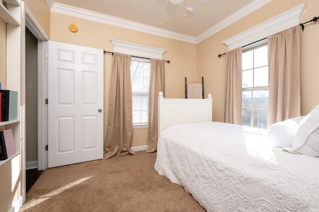 bedroom with ceiling fan, light colored carpet, and ornamental molding