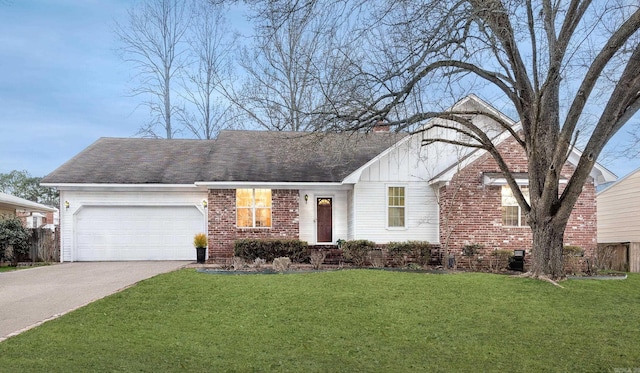 view of front of property with a garage and a front yard