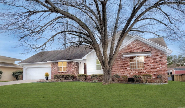 view of front of home featuring a garage and a front yard