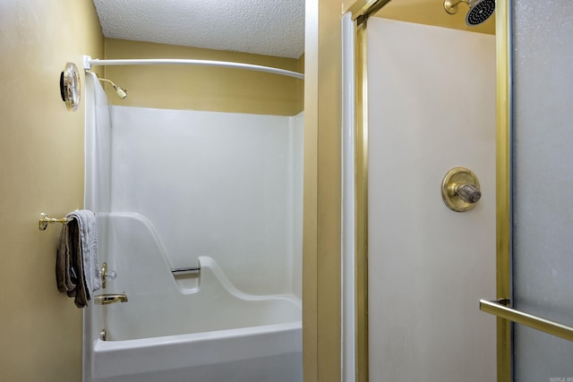 bathroom featuring a textured ceiling