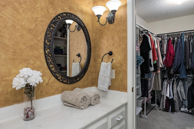 bathroom featuring a textured ceiling