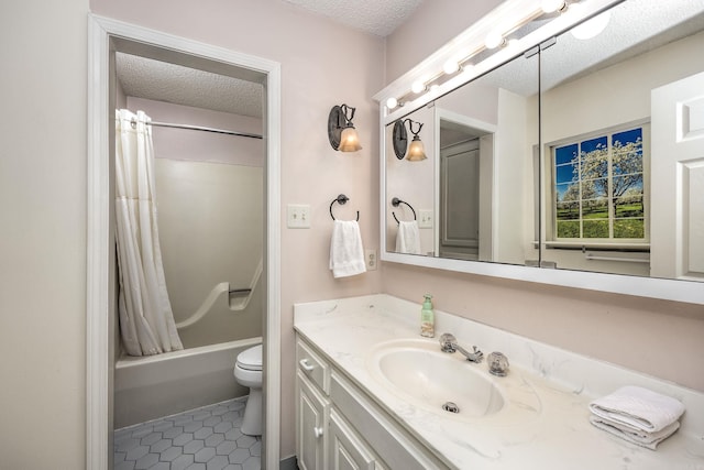 full bathroom with toilet, shower / bath combo with shower curtain, tile patterned flooring, a textured ceiling, and vanity