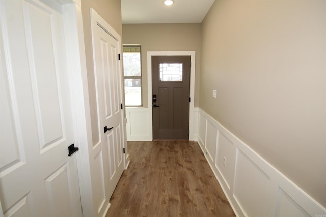 doorway with light hardwood / wood-style floors