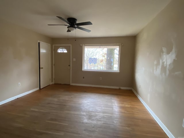 entrance foyer featuring ceiling fan and hardwood / wood-style floors